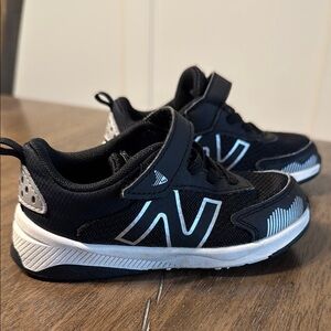 New Balance Black and White Sneakers with Velcro Closure
